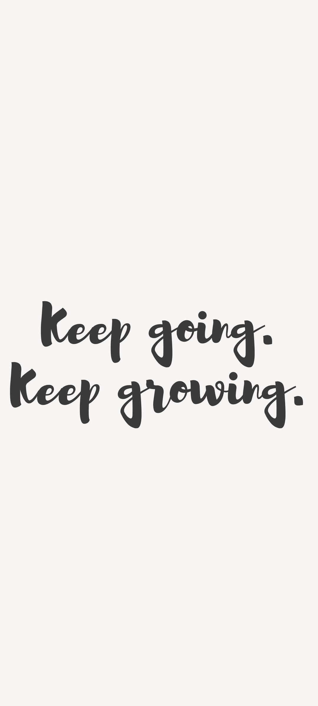 Handwritten script reading keep going keep growing centered on a smooth matte beige textured background.