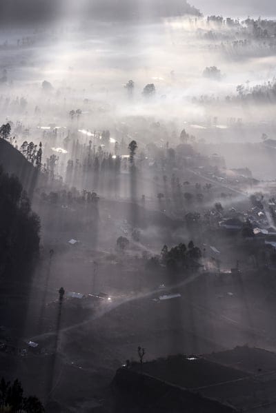 hills,crater,nature,mountain,landscape,adventure,outdoors,indonesia,travel,tourism,asia,morning,scenery,sunrise,peak,fog,rays,phone wallpaper,shadows,silhouette