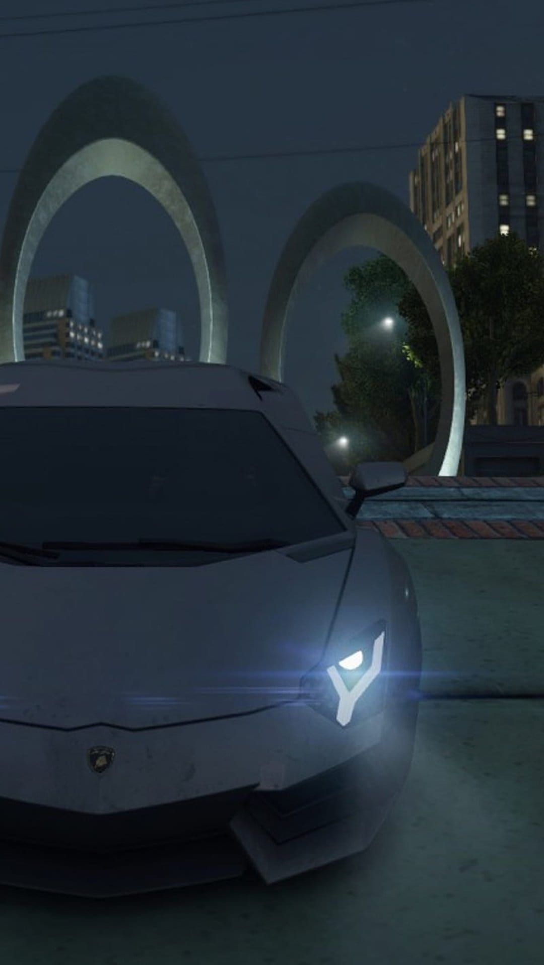 Modern vehicle headlights shine against a dark city backdrop with sharp architectural silhouettes and neon.