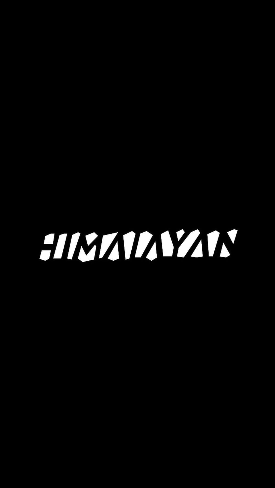 White angular Himalayan lettering with a fragmented geometric design centered against a stark black background.