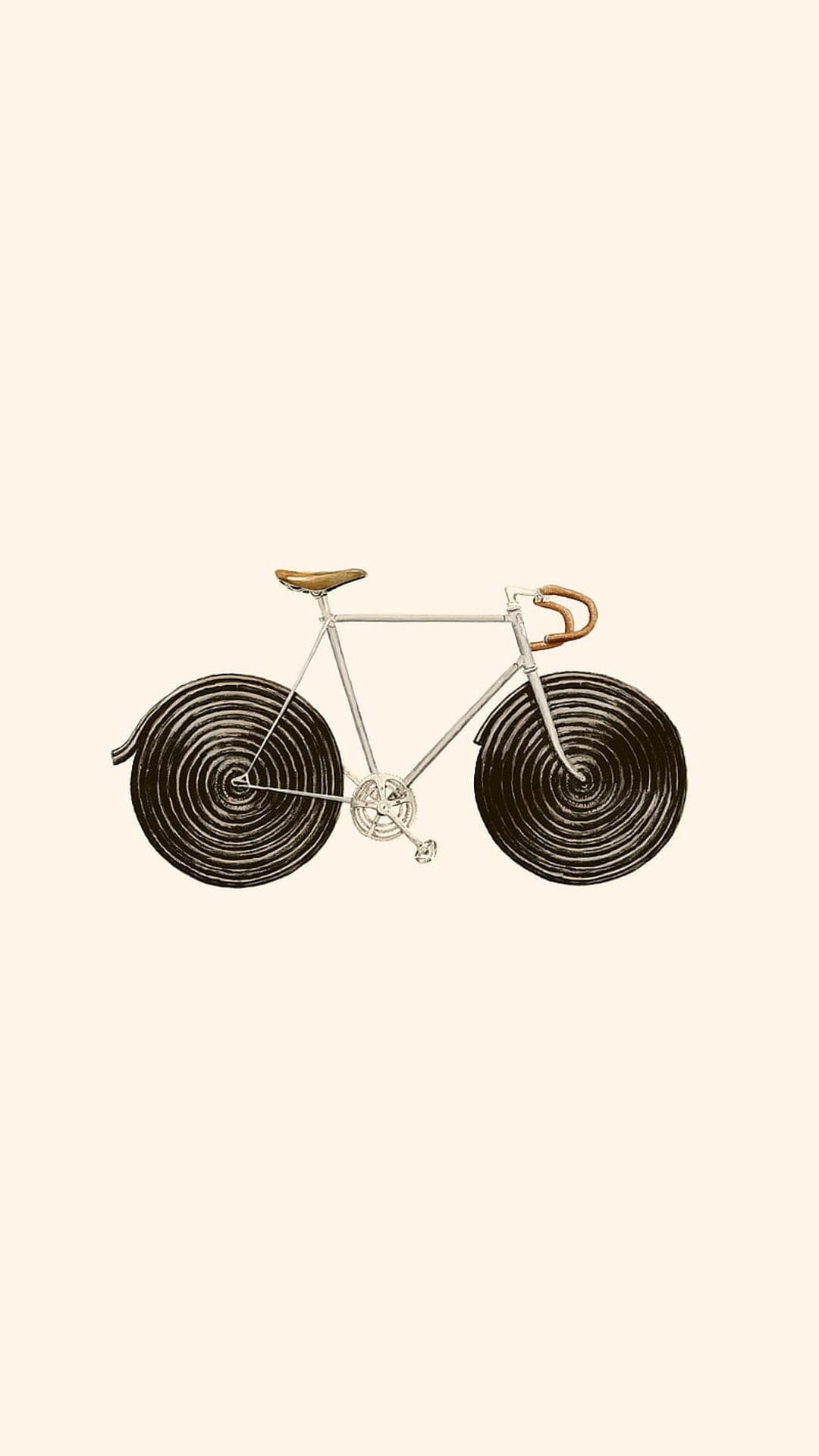 Silver vintage bicycle with a brown leather saddle and dark spiral wheels stands against a plain light backdrop.