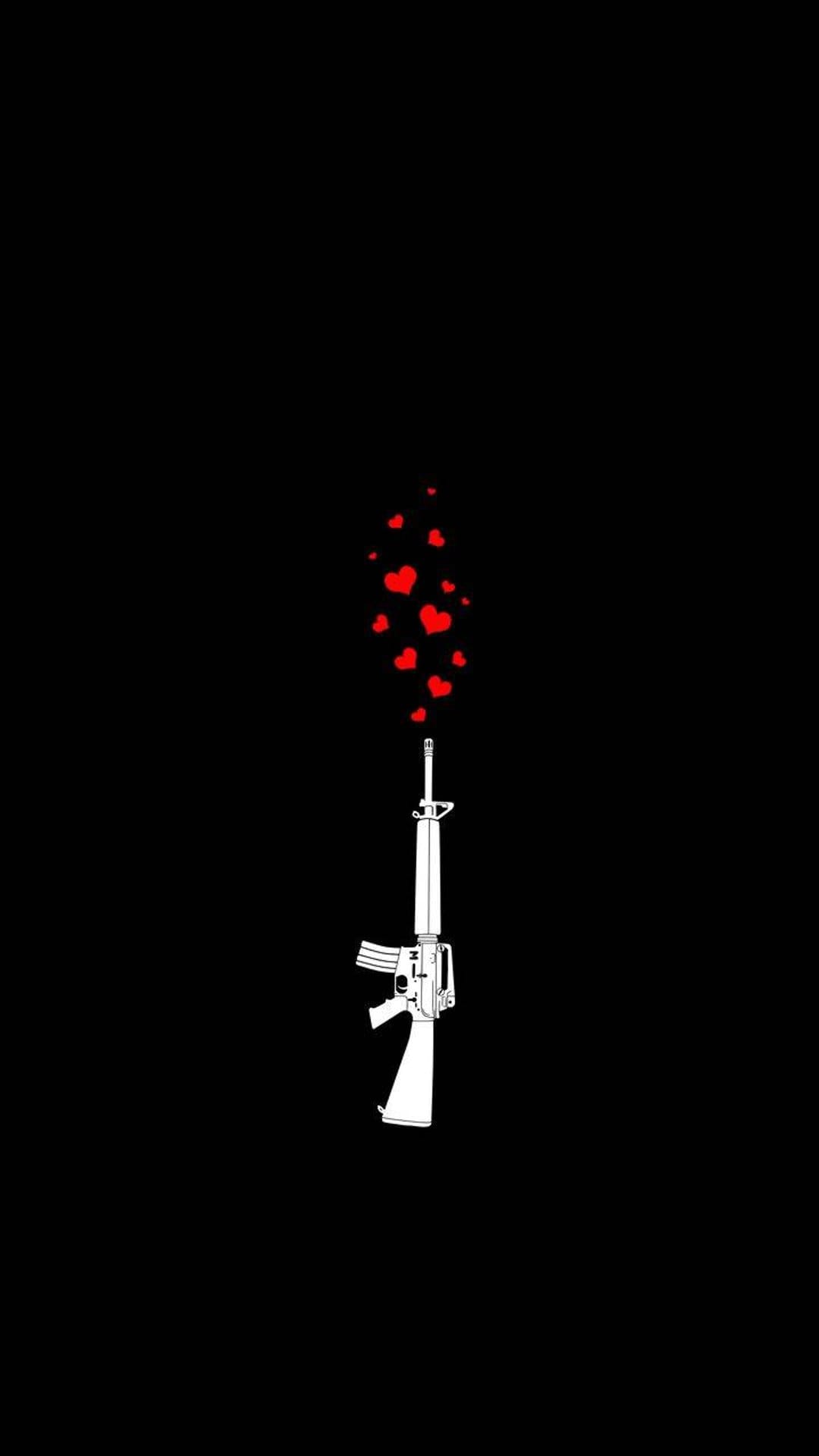 Rifle silhouette discharging small red hearts against a black backdrop, creating a stark visual contrast.