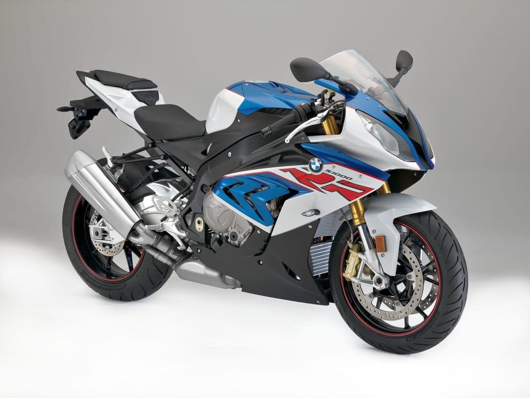 BMW S1000RR sportbike with blue, red, and white fairings positioned on a clean studio background for desktop.
