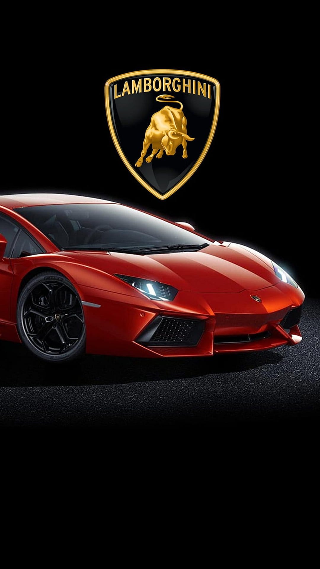 Red Lamborghini Aventador supercar profile with golden bull crest emblem on a solid black background.