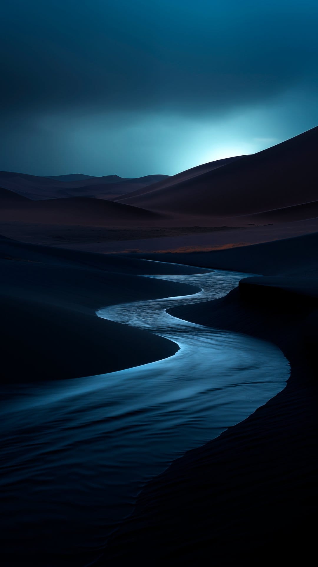 Winding blue river flows between dark sand dunes under a dim twilight sky in a vertical desert landscape.