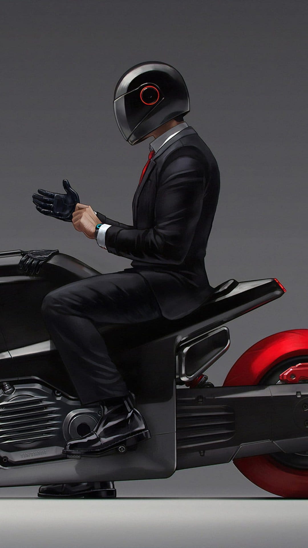 Man in a black suit, red tie, and helmet sits on a sharp futuristic motorcycle with red accents against grey.