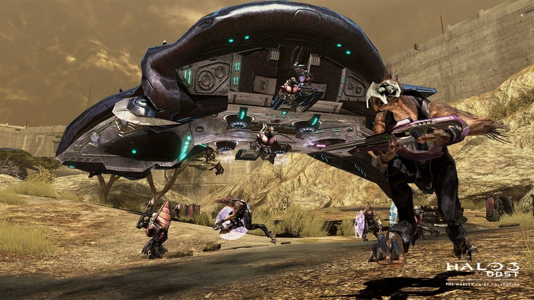 A Covenant Skirmisher holding a carbine in a desert canyon while a Phantom dropship deploys troops above.