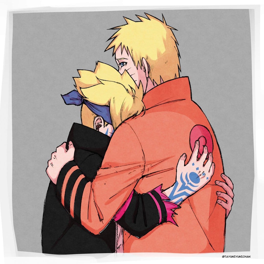 Naruto Uzumaki hugs Boruto Uzumaki while glowing blue sage markings wrap around his right forearm and hand.