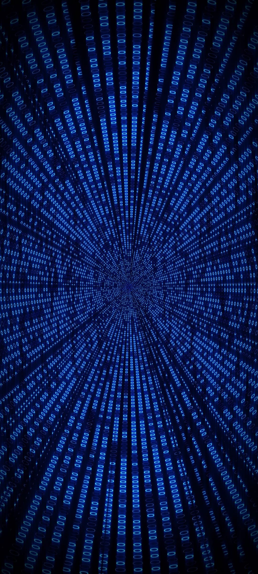 Glowing blue binary code numbers forming a deep perspective tunnel in a dark virtual reality environment.