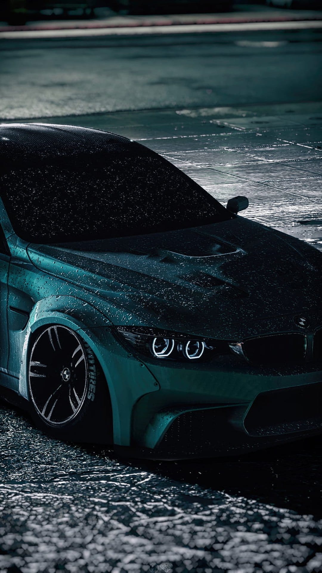 Teal BMW M3 with glowing headlights parked on wet asphalt during a rainy night under urban lighting.