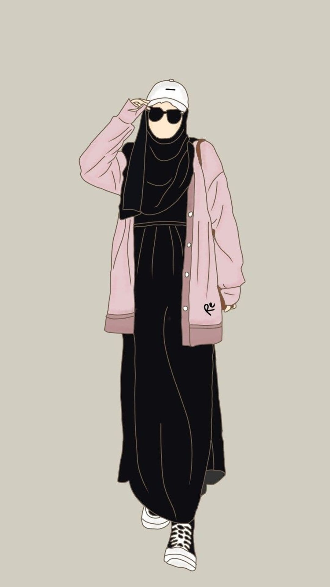 Muslim woman in a black hijab, white baseball cap, and pink cardigan posing in a minimalist fashion style.