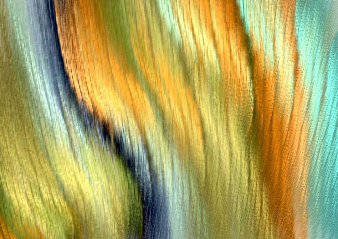 Swirling currents of amber orange and deep teal blue interlock with fine, flowing linear textures and gradients.