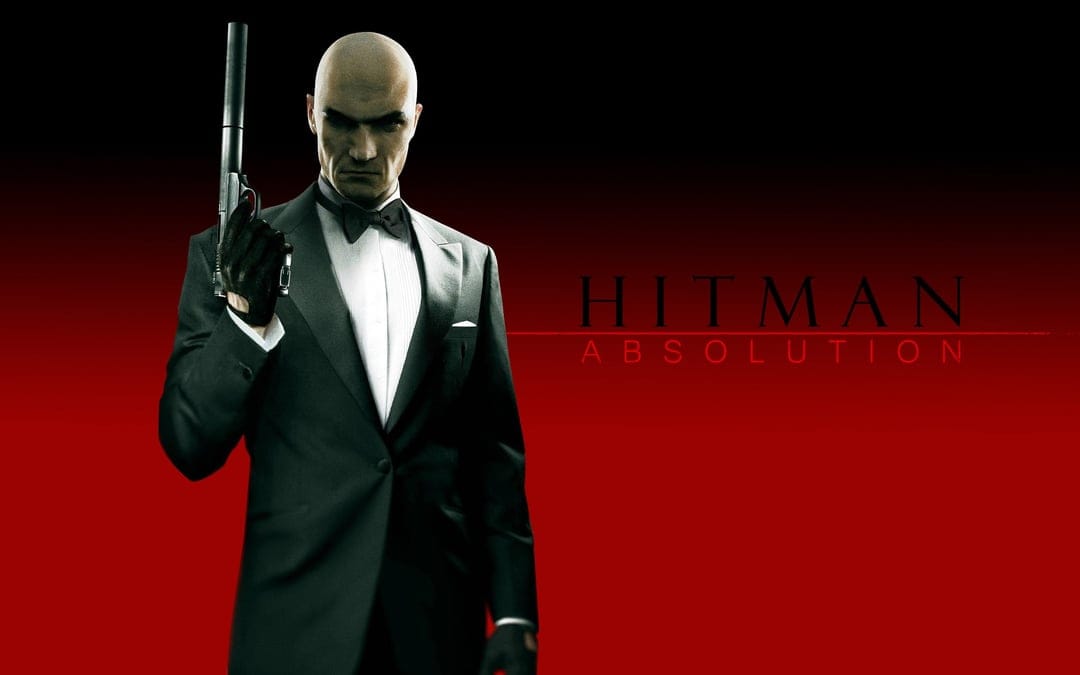 Agent 47 in a black tuxedo holding a suppressed pistol against a minimalist deep red and black background.