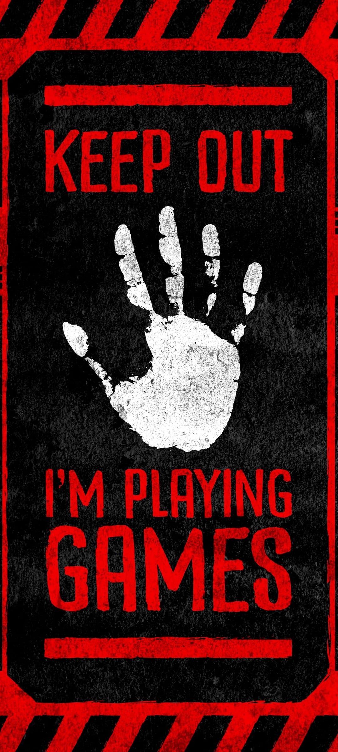 Red warning text stating Keep Out I'm Playing Games on a black textured background with a white handprint.