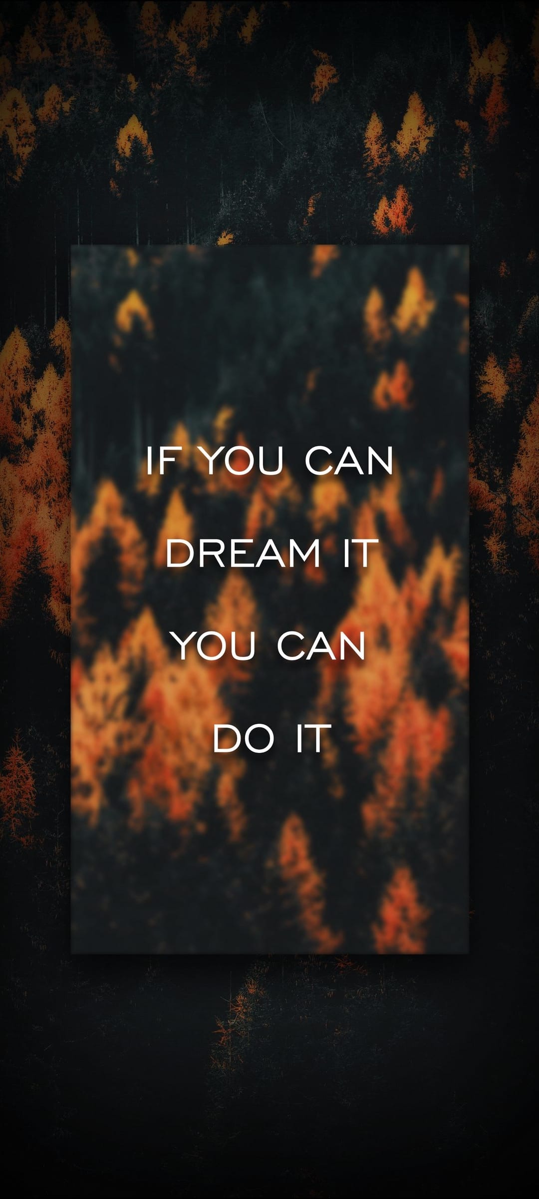 White sans-serif text reading If you can dream it, you can do it over a dark blurred autumn forest background.