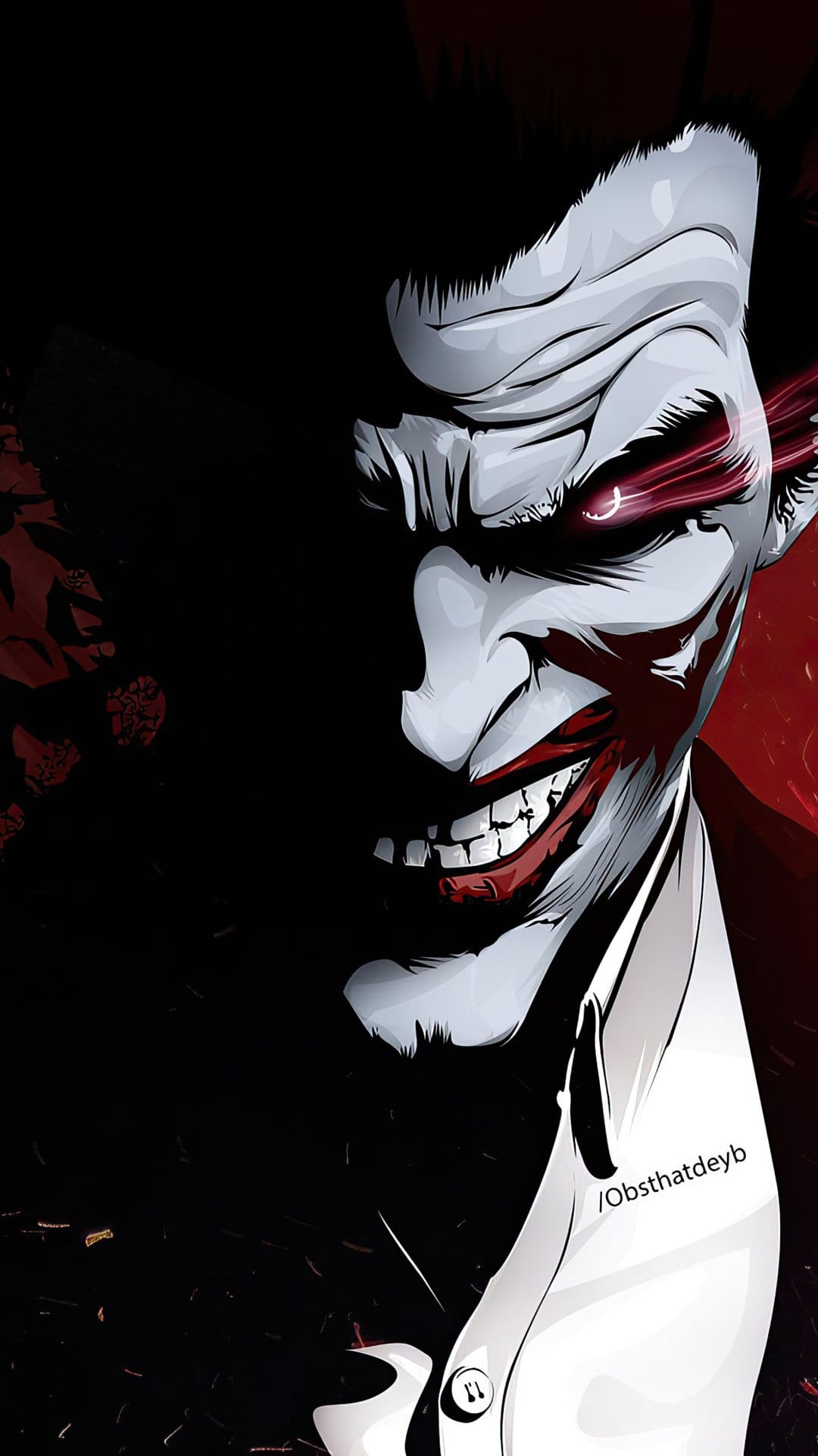Joker with a wide menacing grin and glowing red eyes emerging from deep shadows and crimson atmospheric light.