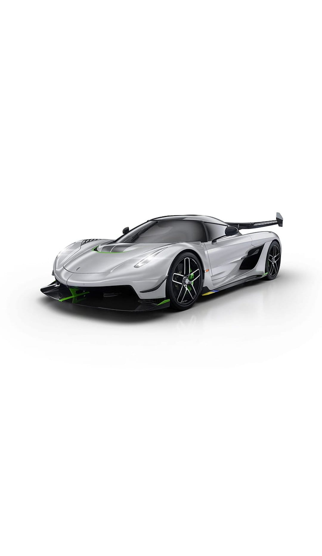 Silver Koenigsegg Jesko hypercar with green trim on its front splitter and wheels against a white background.