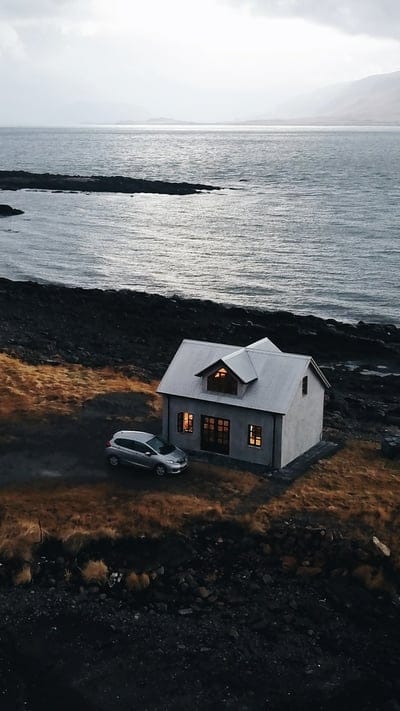 House, coast, nature, landscape, peaceful, serene, tranquil, beautiful, outdoor, aerial, ocean, rugged, remote, dark, sky, clouds, isolated, quiet, shoreline, solitude