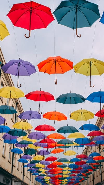 Umbrella Sky, Colorful, Street Art, Installation, Urban, Bright, Playful, Whimsical, Decoration, Canopy, Artistic, Vibrant, Fun, Outdoor, Display, City, Art Project, Rainbow, Festival, Unique