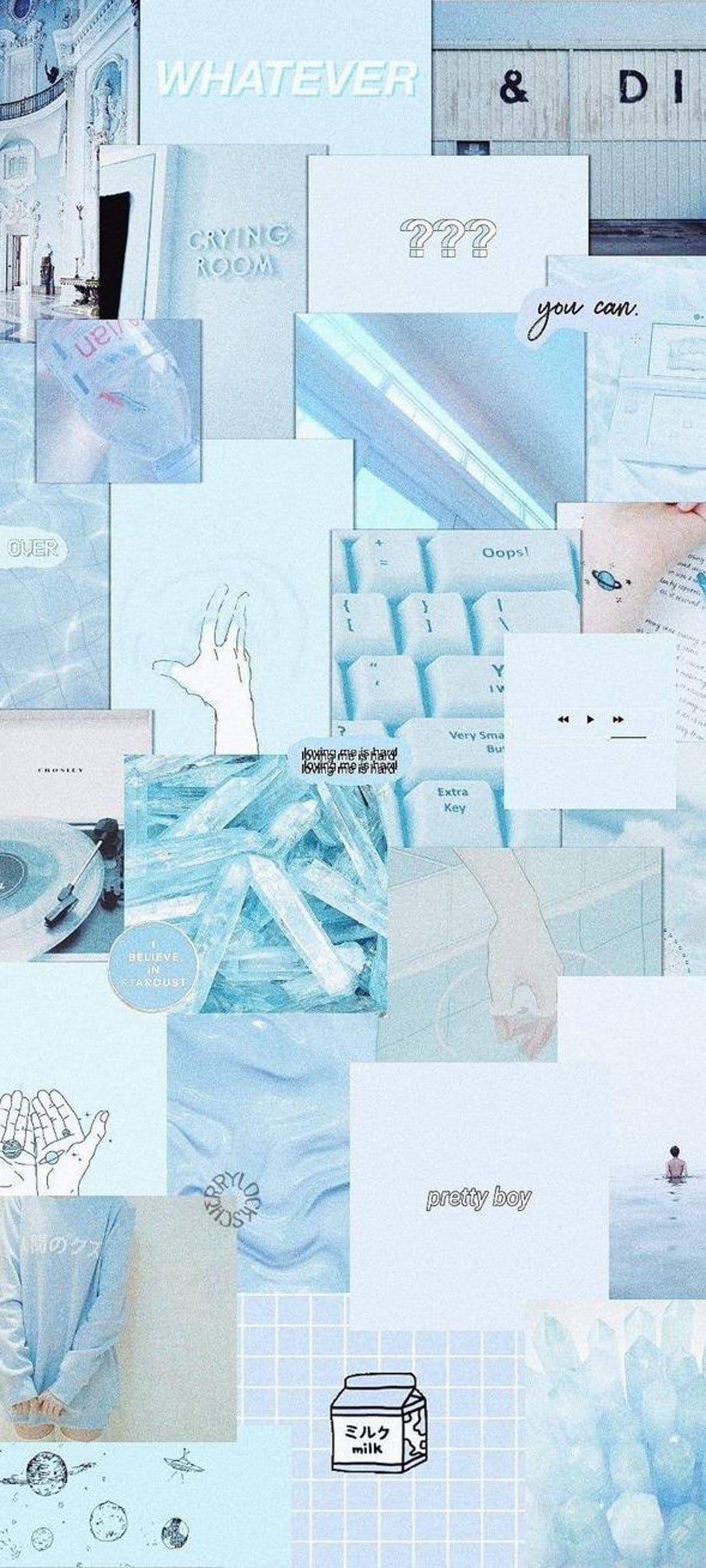 Blue vinyl record rests near handwritten notes, scattered quartz crystals, and a celestial moon illustration.