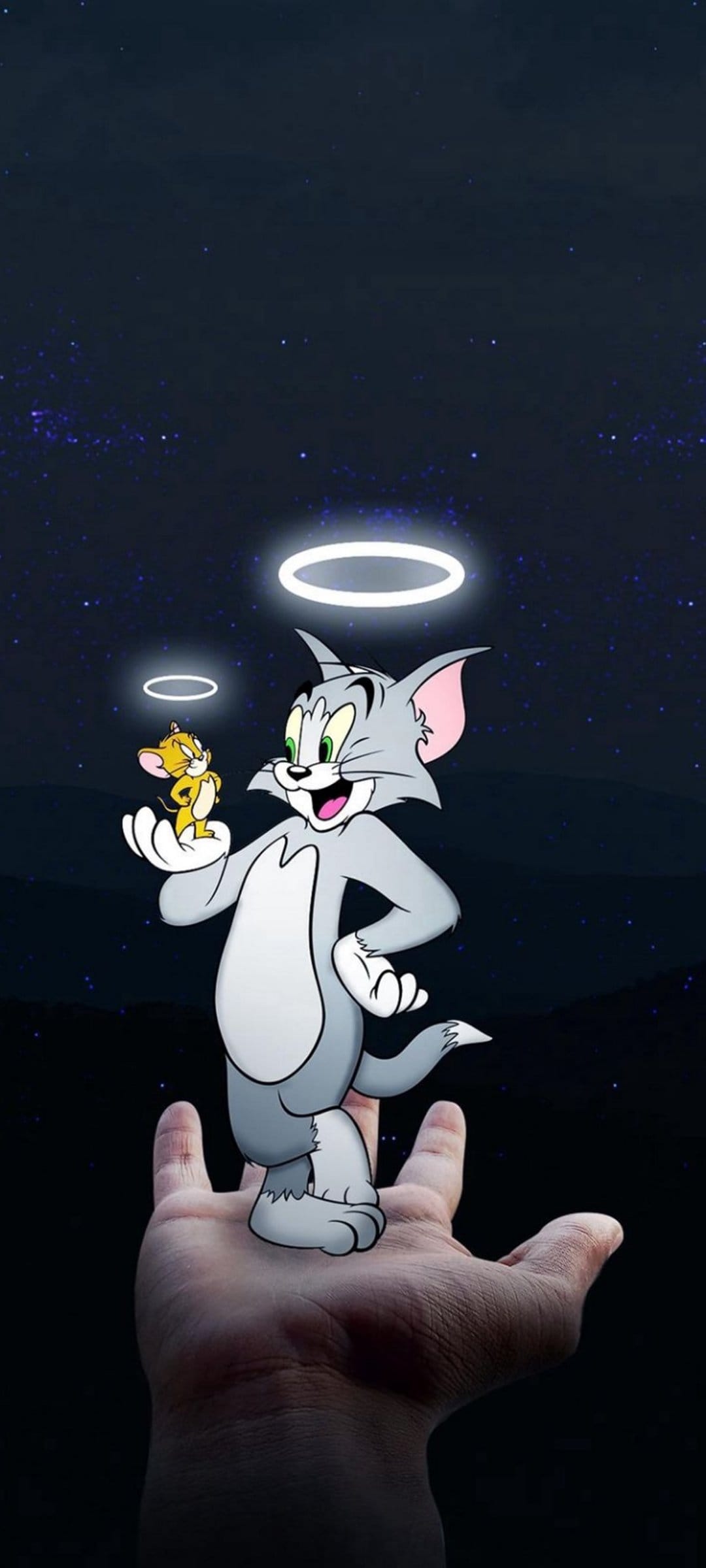 Tom and Jerry as angels with glowing halos hold hands above a large palm against a dark starry night sky.