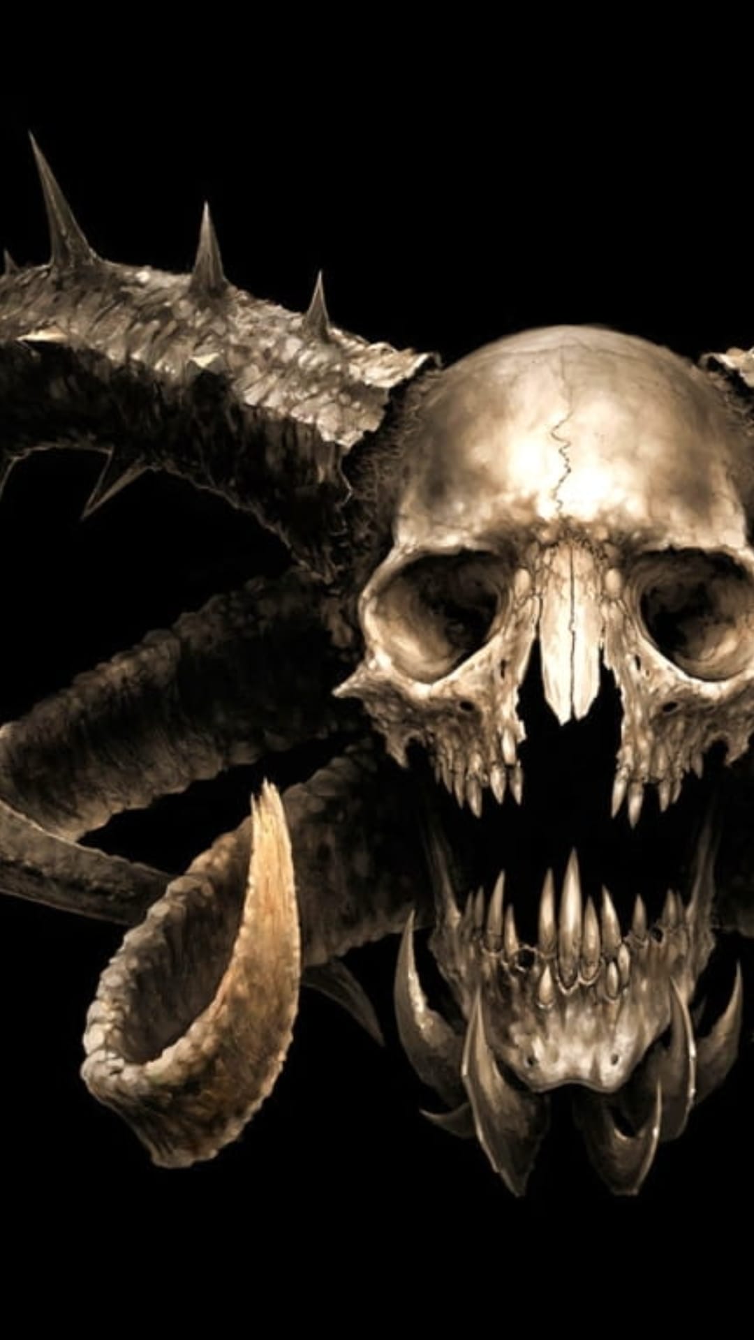Horned demonic skull with a gaping mouth of sharp teeth and empty eye sockets against a solid black background.