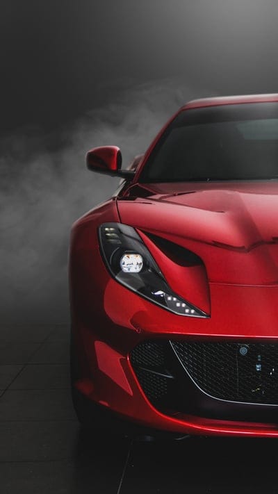 sports car,red,front view,smoke