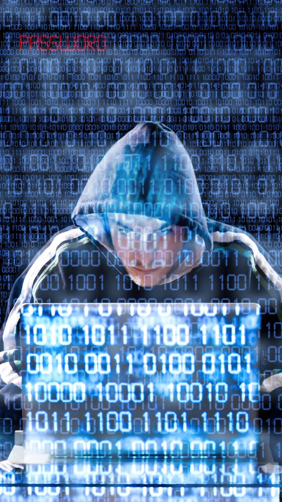 Hooded figure with a blue binary code face mask typing on a laptop amidst red and blue digital data streams.