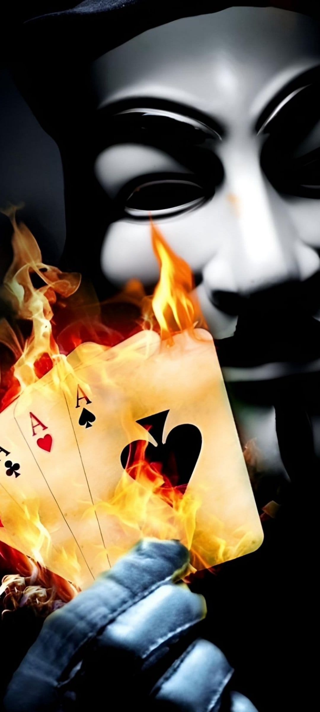 Masked person holding four flaming poker aces against a dark backdrop with embers and dramatic orange lighting.