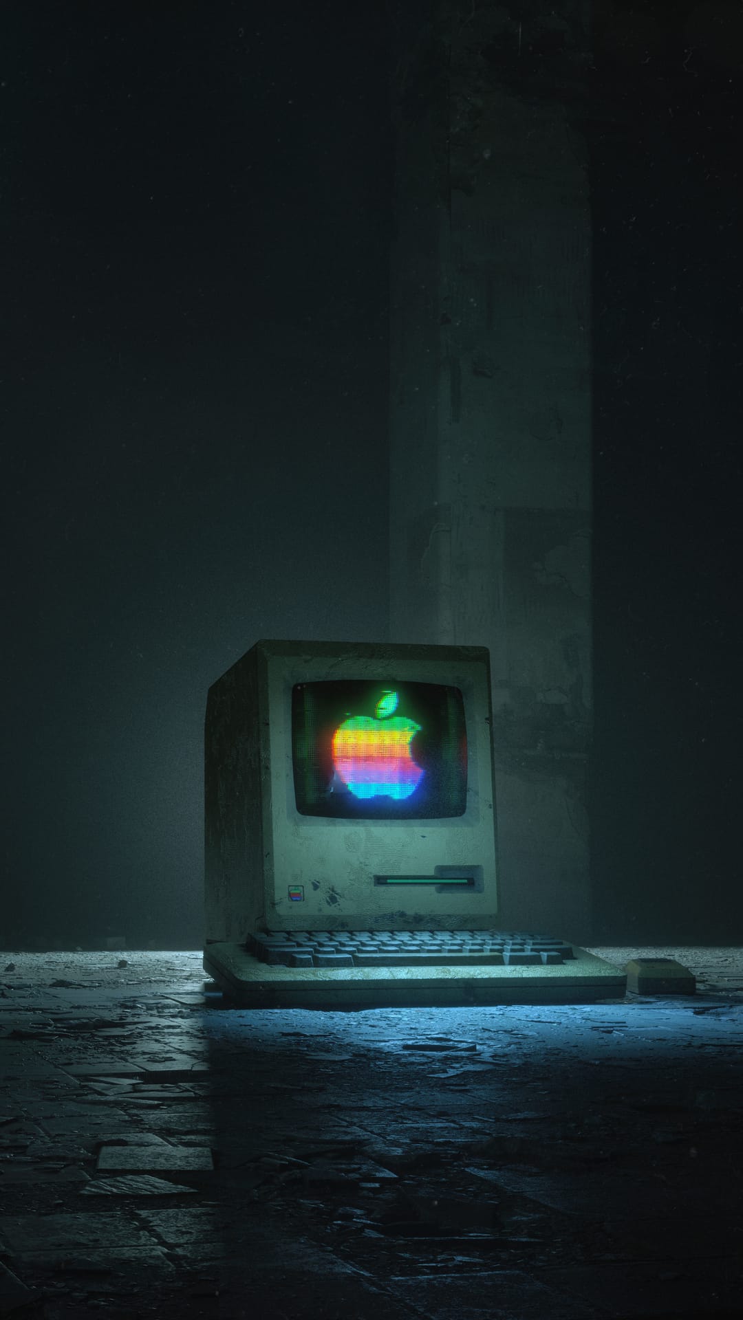 Vintage Macintosh computer glowing with a rainbow Apple logo in a dark, dusty room with industrial flooring.