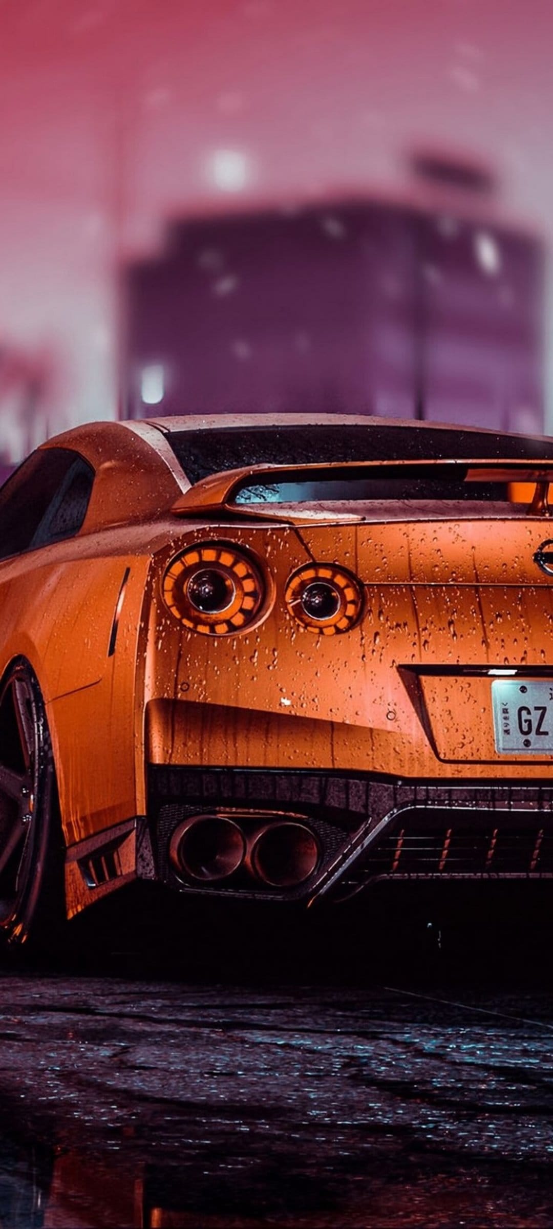 Orange Nissan GT-R sports car rear view with glowing taillights on a wet city street during a rainy night.