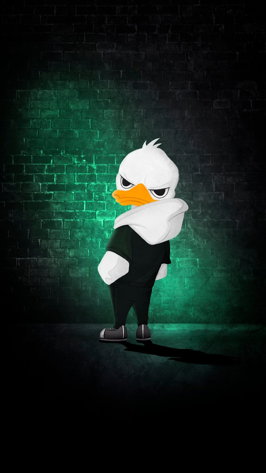 Grumpy white duck wearing a black hoodie and sneakers stands against a dark brick wall lit by green neon light.
