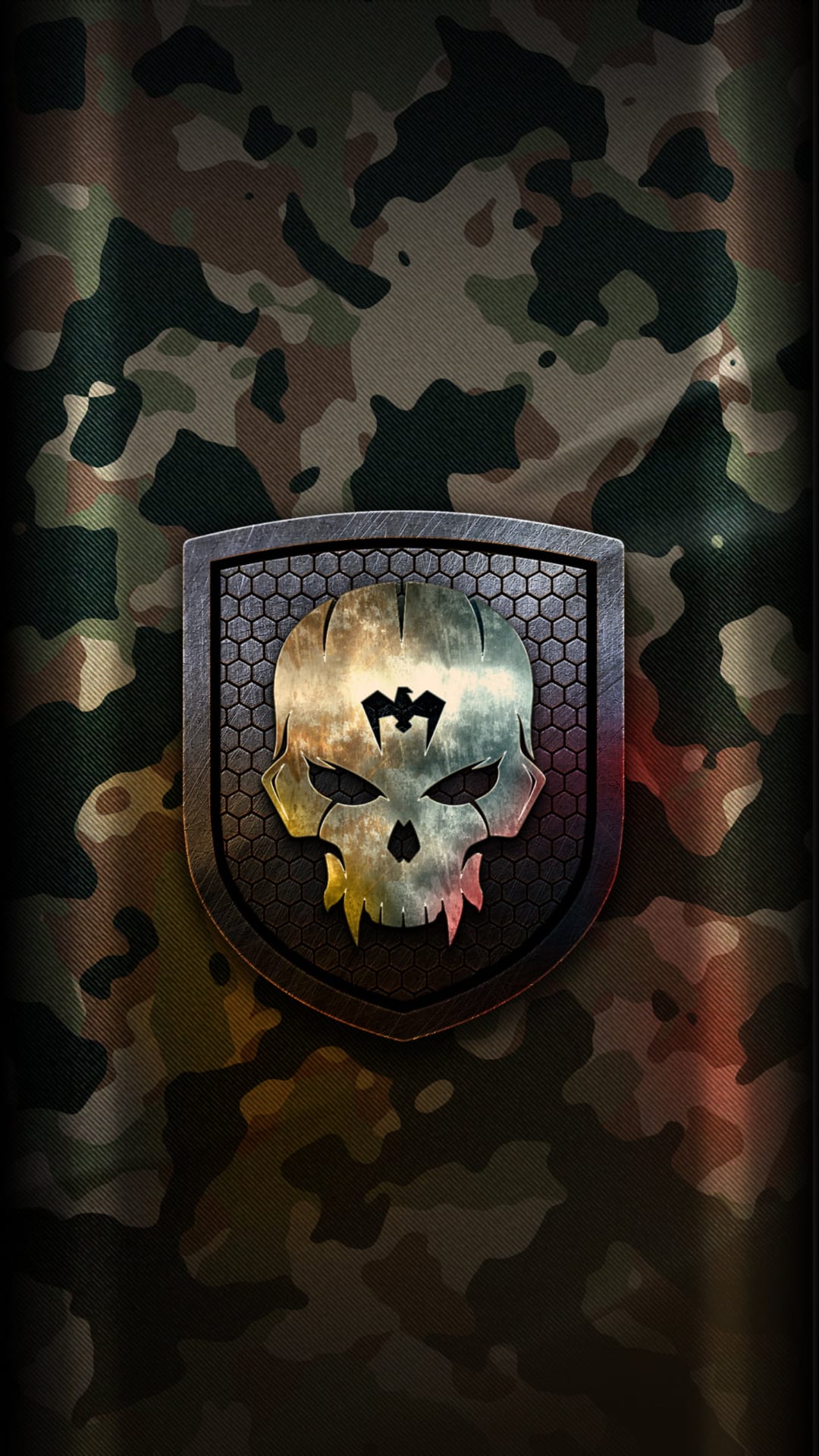 Chrome skull with fangs and a forehead crest centers a hexagonal shield over rugged camouflage patterns.