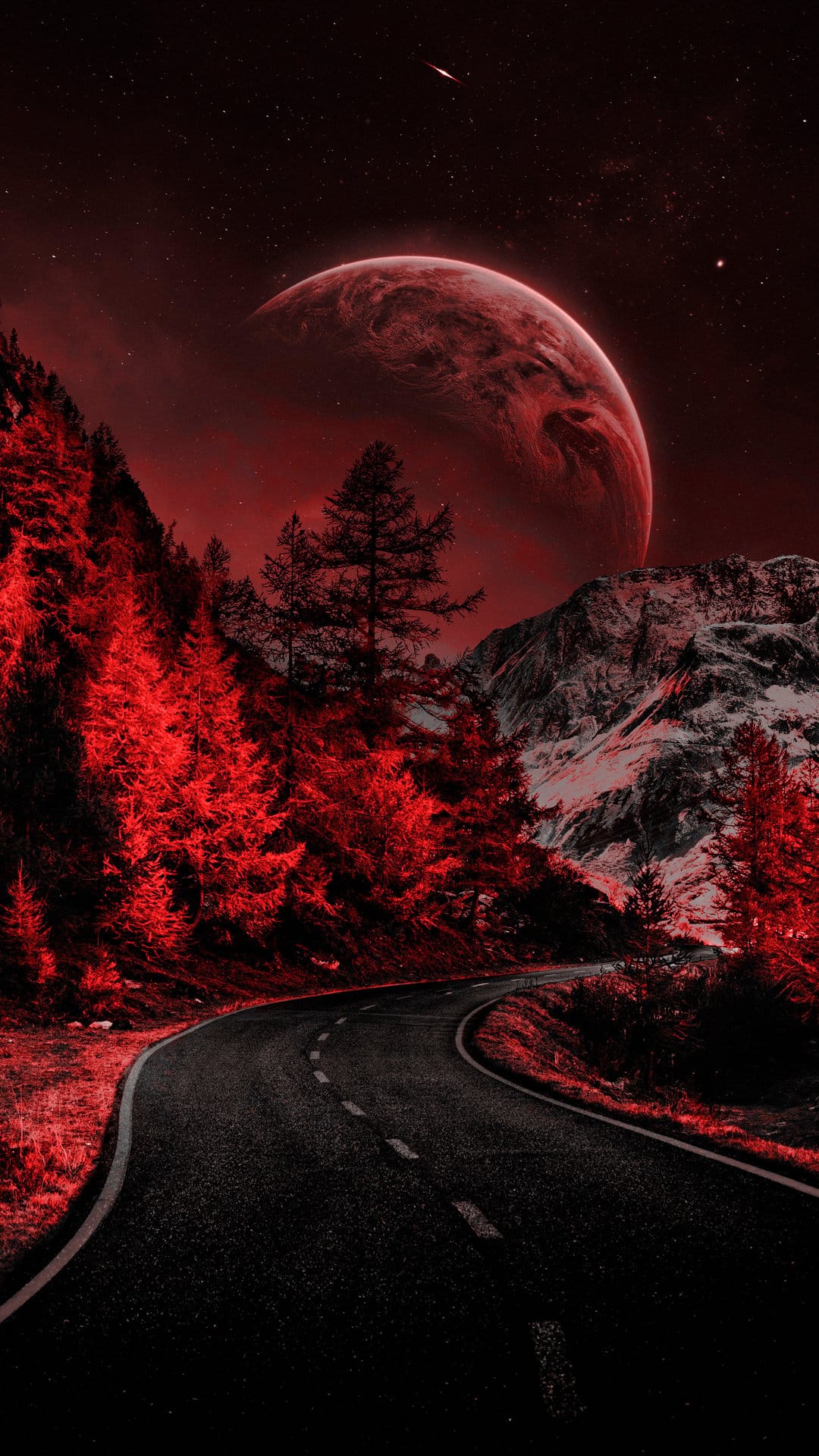 Winding asphalt road through a crimson forest under a massive red planet and starry sky with snowy mountains.
