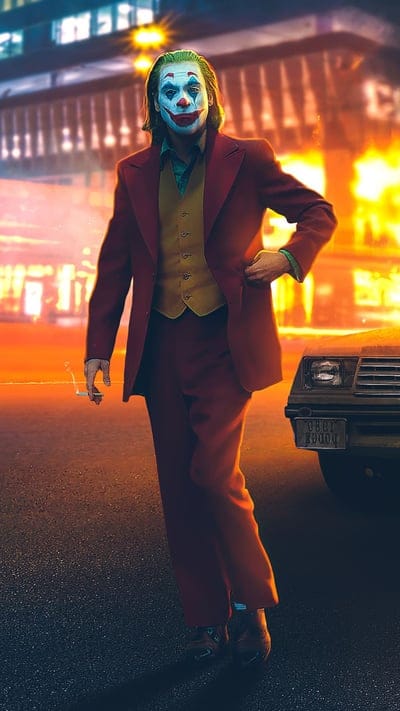 Joker, Joaquin Phoenix, DC Comics, cinematic, Gotham, character study, red suit, villain, iconic walk, movie scene, urban, night, psychological, fan art, anticipation, theatrical, supervillain, comic book, portrait, unsettling