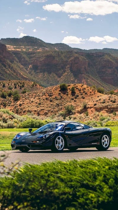 McLaren F1, black, car, classic, mountains, esports, supercar, mobile wallpaper, android wallpaper, iPhone wallpaper, phone wallpaper