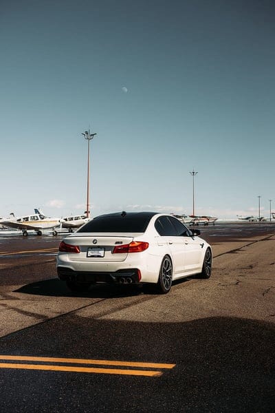 bmw m5, bmw, car, white, airport, mobile wallpaper, android wallpaper, iPhone wallpaper, phone wallpaper