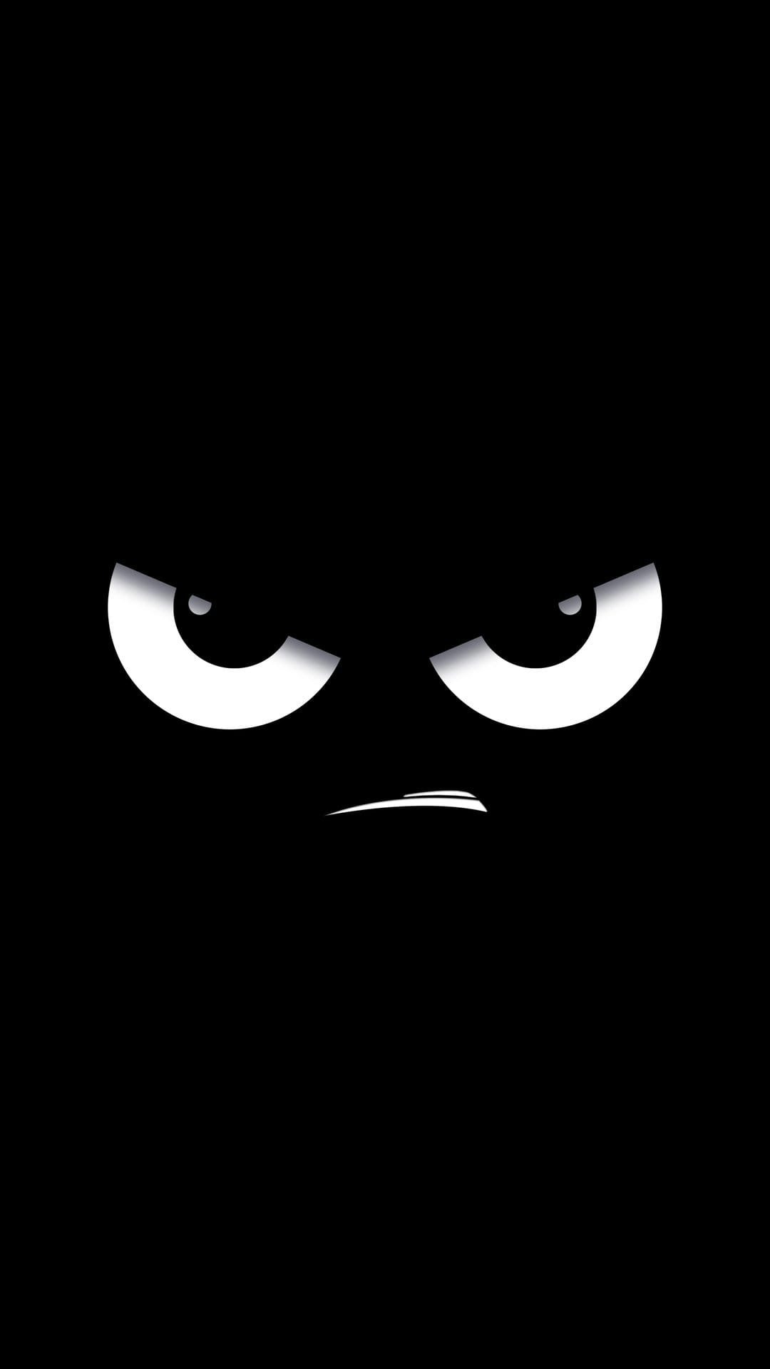 Angry white cartoon eyes with a small scowling mouth centered on a solid black vertical background.