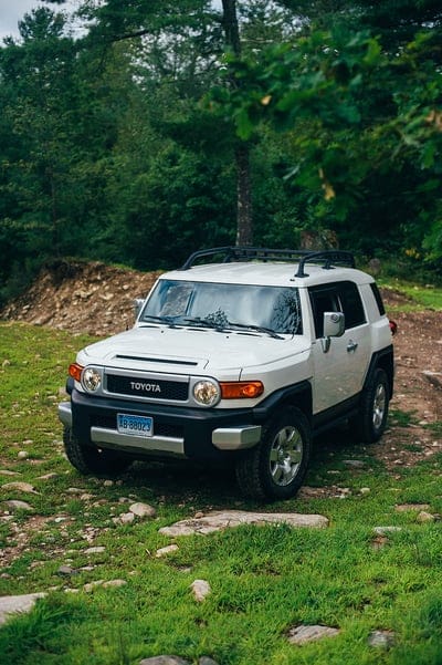 toyota fj cruiser, toyota, car, suv, gray, forest, grass, mobile wallpaper, android wallpaper, iPhone wallpaper, phone wallpaper