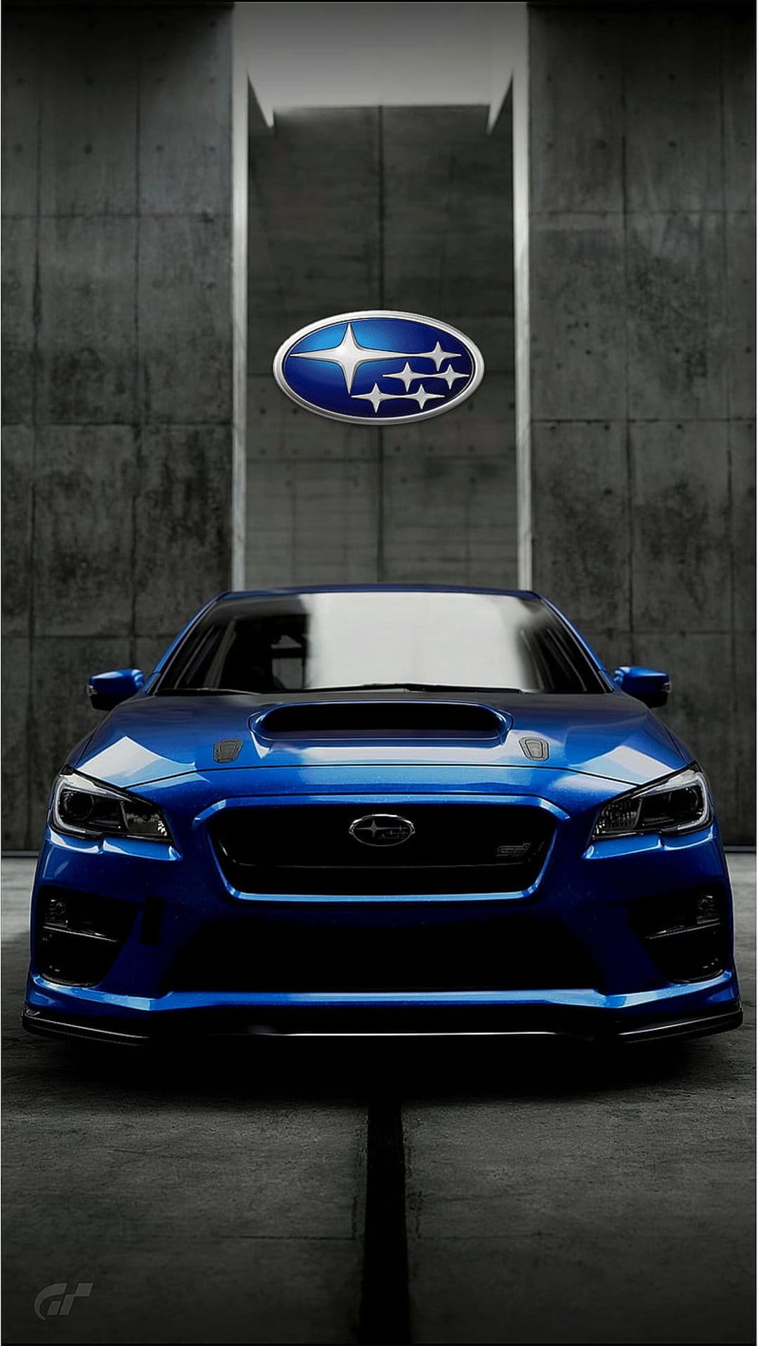Blue Subaru WRX STI front view with the Pleiades logo centered on a black mesh grille over concrete flooring.