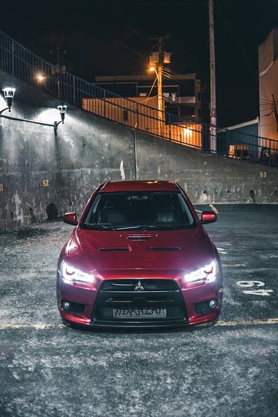 mitsubishi, car, red, front view, night, mobile wallpaper, android wallpaper, iPhone wallpaper, phone wallpaper