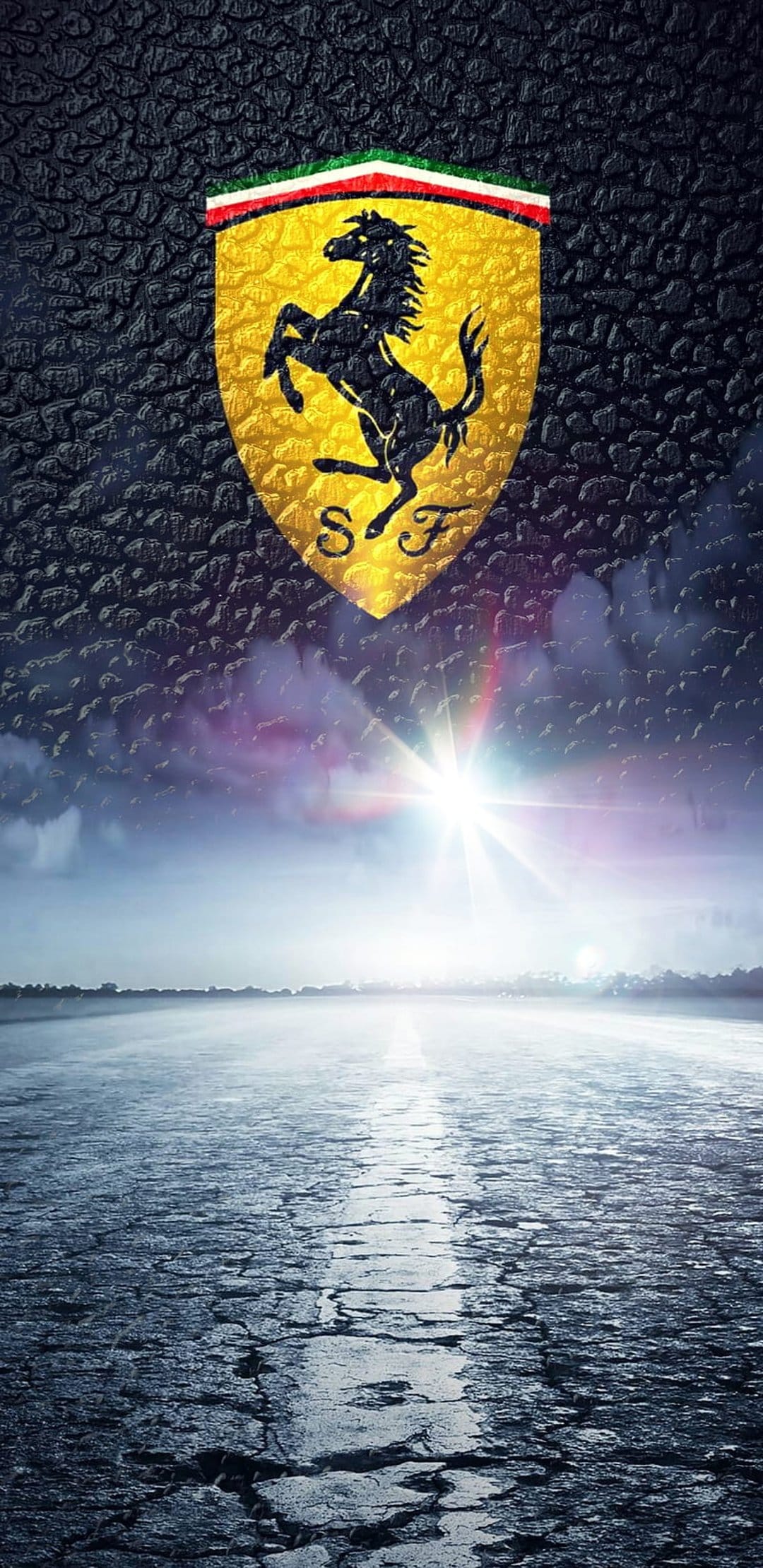 Ferrari prancing horse logo above a glowing sunburst illuminating a misty reflective road in vertical format.