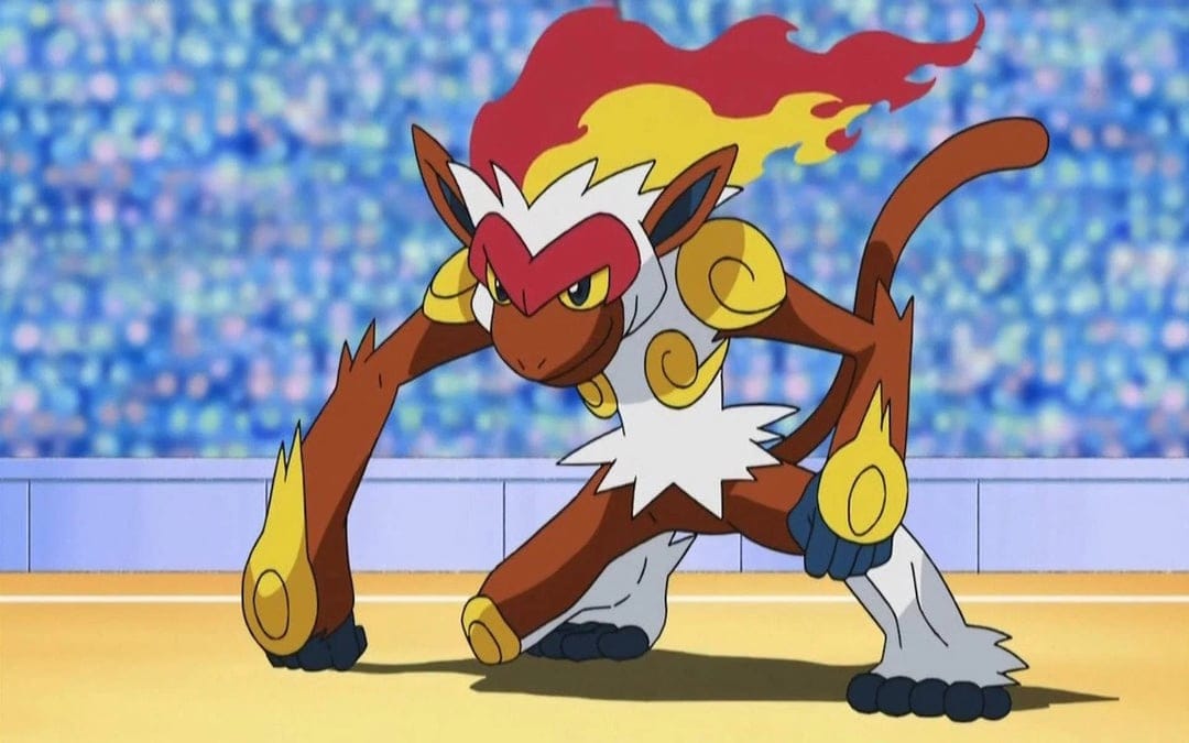 Infernape Pokémon in a low battle stance with bright head flames in a blurred stadium arena with a blue crowd.
