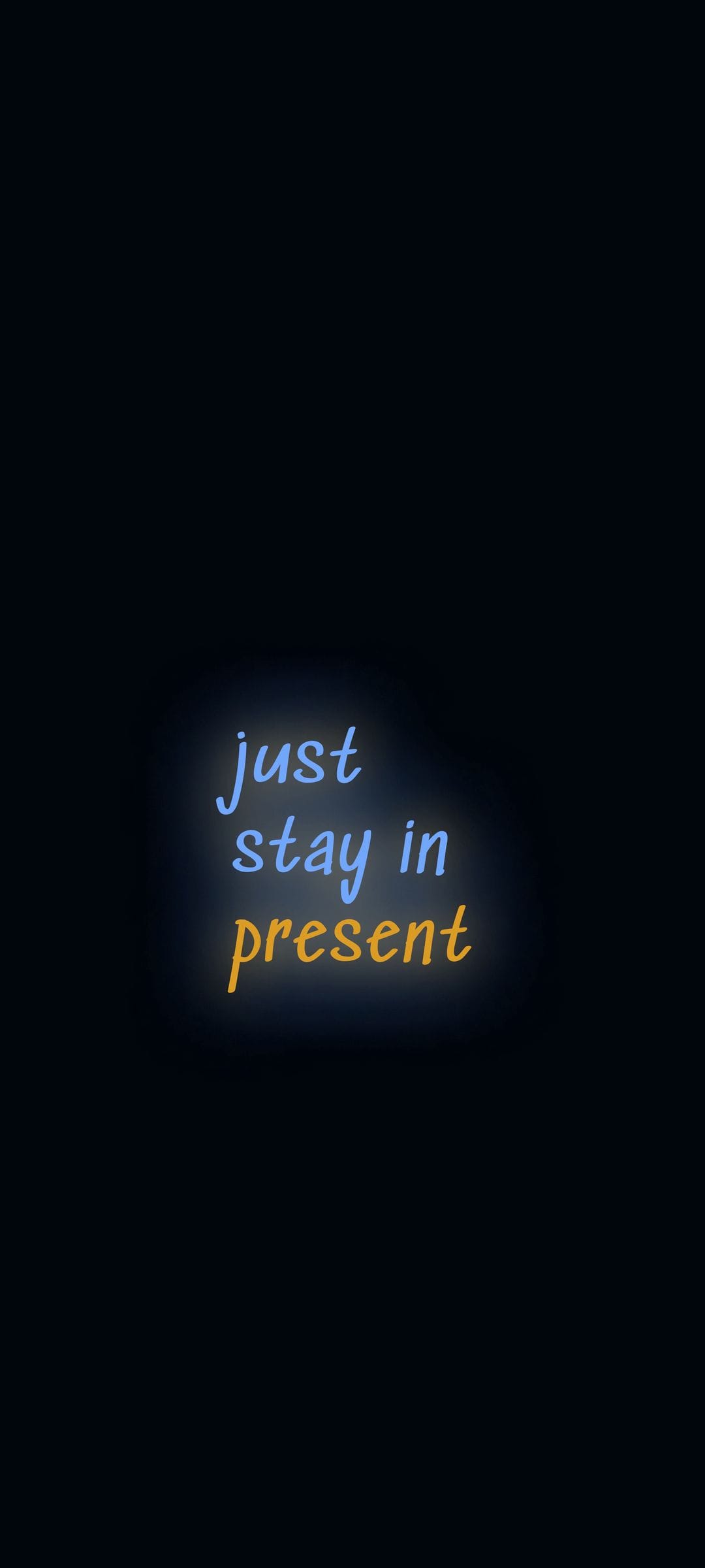 Glowing neon blue and yellow text reading just stay in present centered on a dark vertical background display.