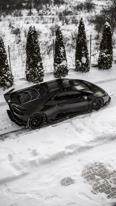 Winter Lambo, lamborghini, huracan, black, car, supercar, sports, new, snow, mobile wallpaper, android wallpaper, iPhone wallpaper, phone wallpaper