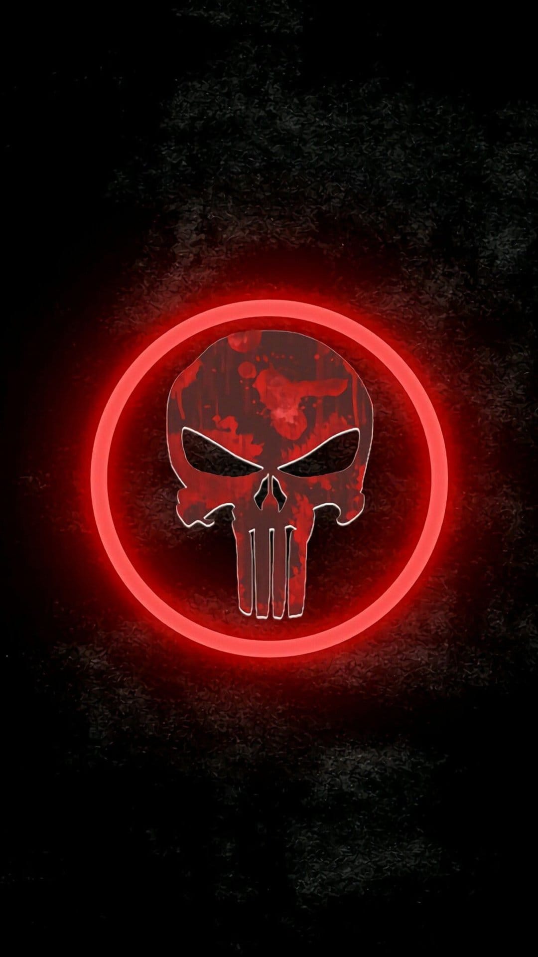 Punisher skull emblem with a weathered red texture is centered inside a glowing neon ring on a black background.