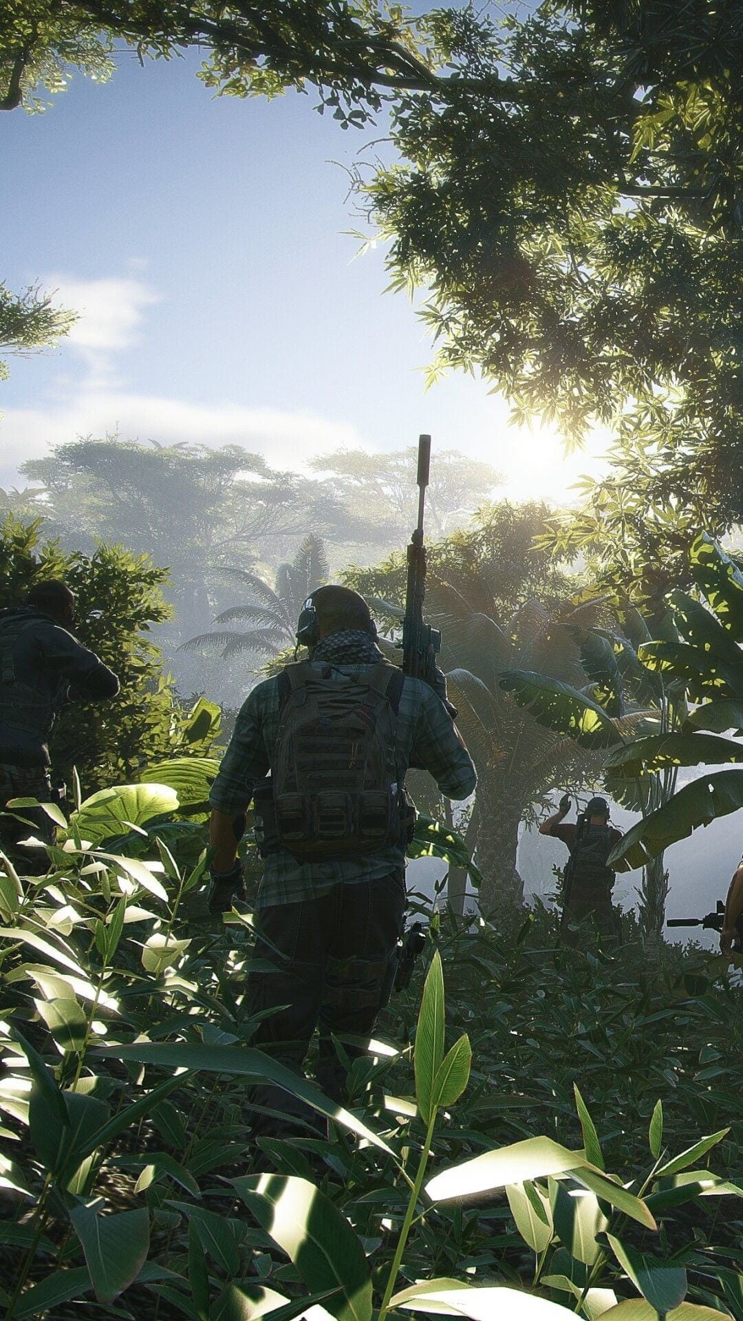 Camouflaged soldiers move through a dense rainforest with sunlight filtering through leaves and a sniper in front.