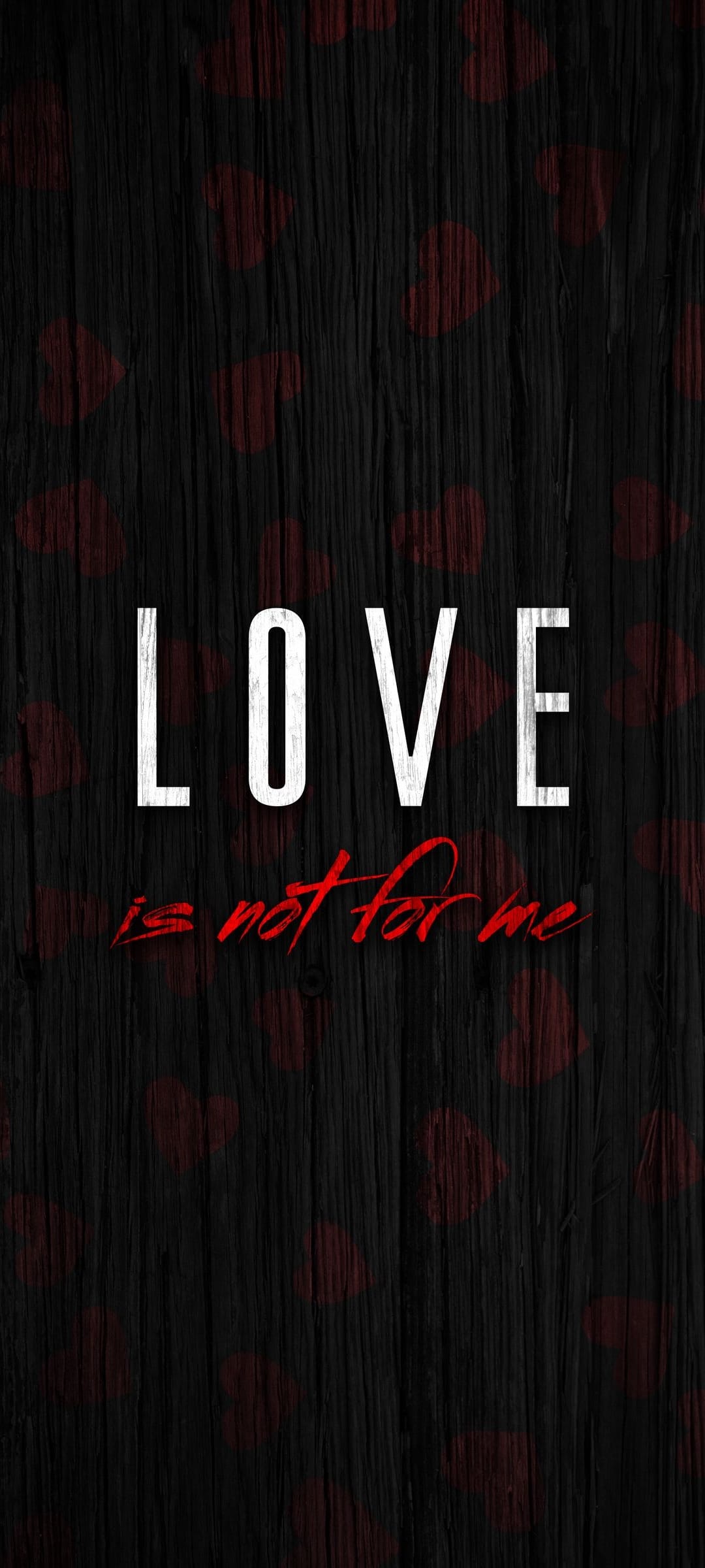 White LOVE text and red script reading is not for me over dark wood texture with small red heart shapes.