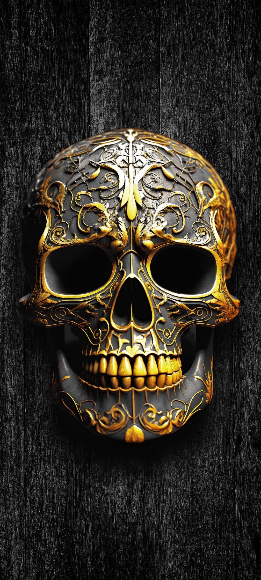 Gold skull with intricate filigree carvings sits on a textured black wooden surface with dramatic lighting.