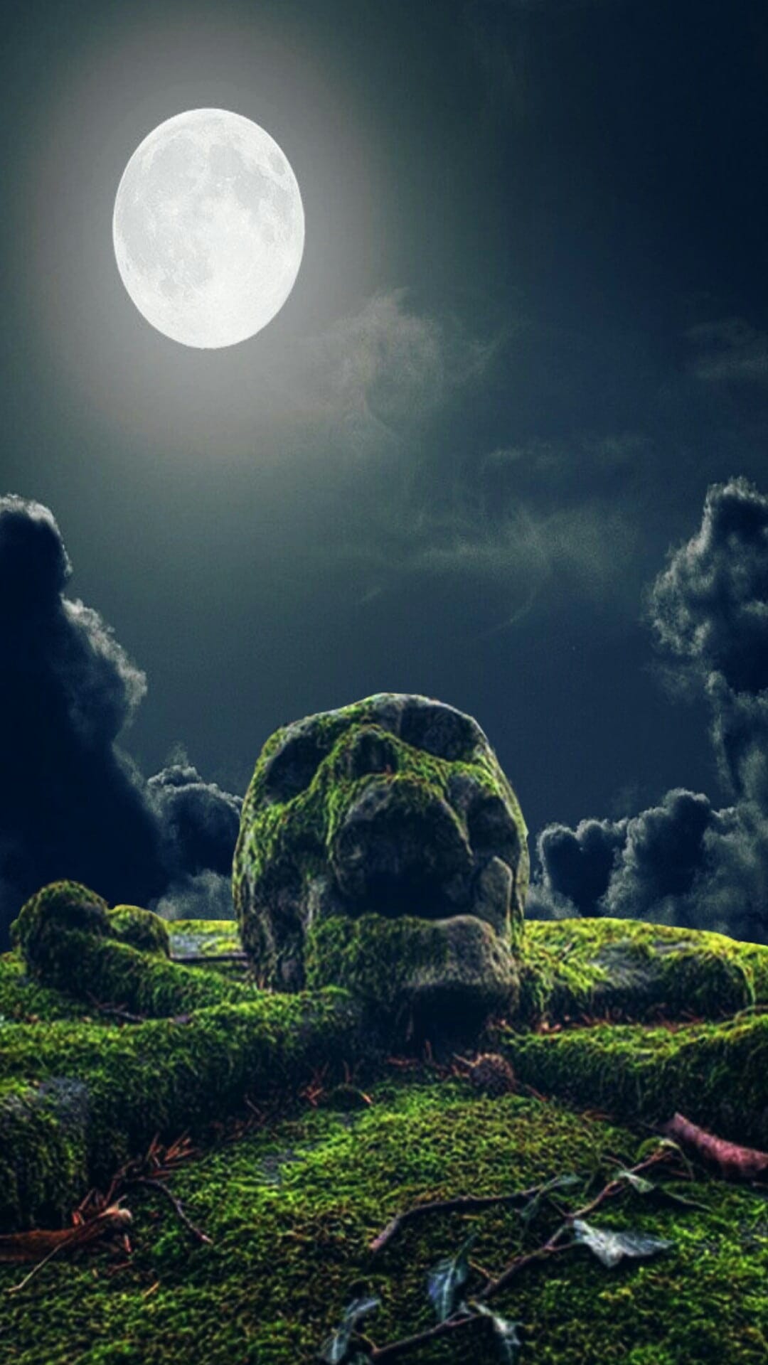 Skull-shaped rock covered in green moss under a bright full moon and cloudy night sky with dramatic shadows.
